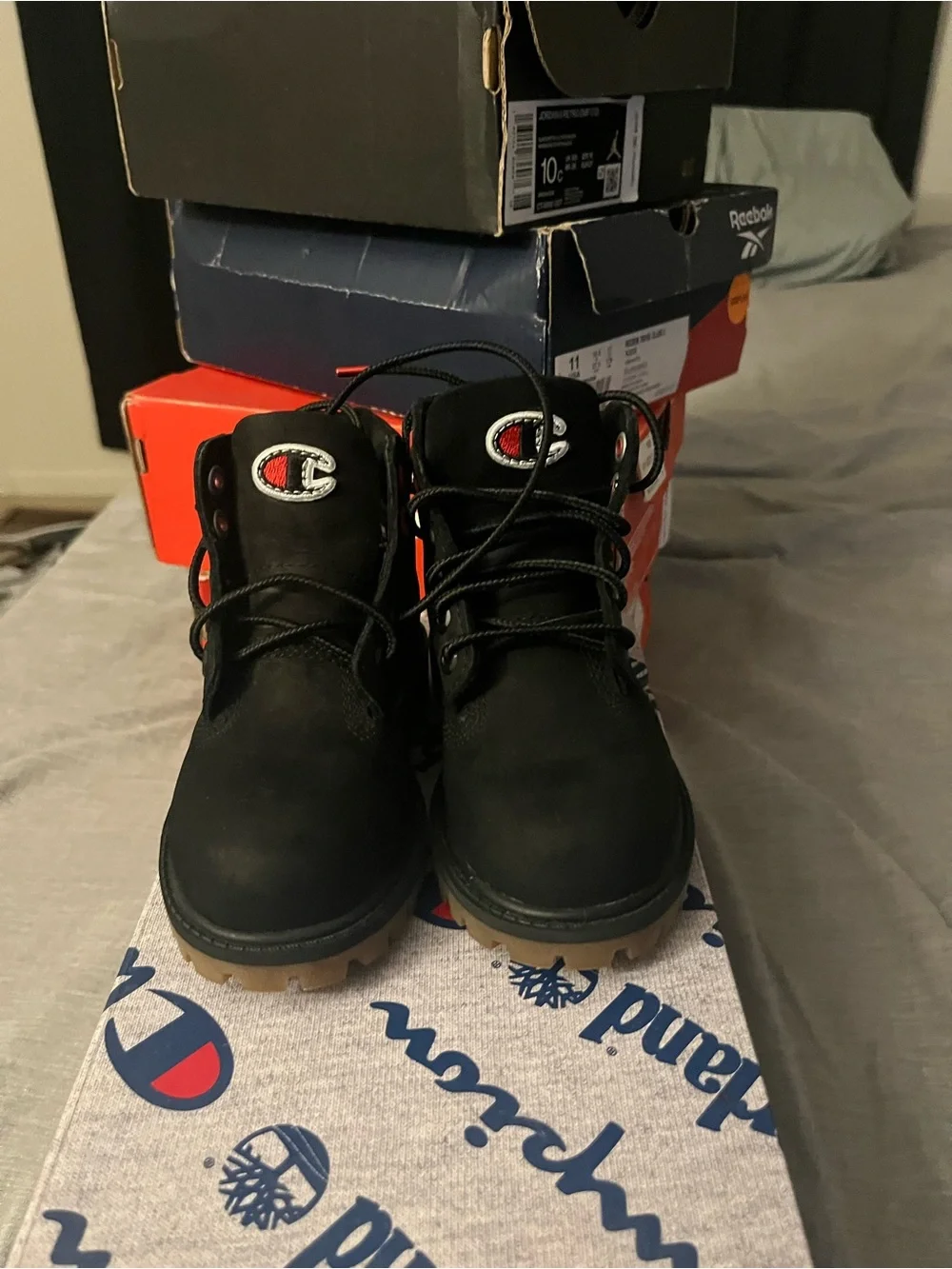 Timberland Kids Black Lace-Up Boots with Brown Outsole and Red Eyelets